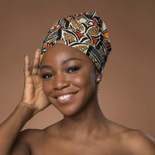 Load image into Gallery viewer, Easy headwrap - Satin lined hair bonnet - Red & Orange Bogolan Symbols