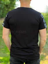 Load image into Gallery viewer, T-shirt with African print details - black bogolan sleeves and chest pocket
