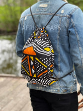 Load image into Gallery viewer, African Print Drawstring Bag / Gym Sack / School bag / Ankara Backpack / Festival Bag - Yellow / orange bogolan

