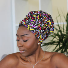 Lade das Bild in den Galerie-Viewer, Easy headwrap&lt;/i&gt; – Satingefütterte Haarhaube – Gelb/lila Tribal-Druck
