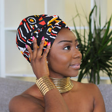 Load image into Gallery viewer, Easy headwrap - Satin lined hair bonnet - Orange / black Adaobi
