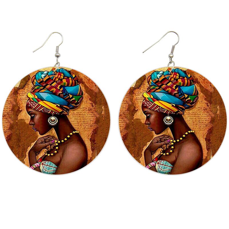 Boucles d'oreilles en bois d'inspiration africaine | femme africaine